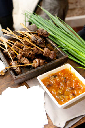 A mushroom based canape is served at a cocktail partyの写真素材