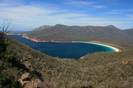 The famous Wineglass Bay from Mt Amos lookout in Freycinet National Park in Tasmaniaの写真素材