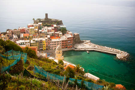 Vernazza shines on a clear winter's day in the Cinque Terre, Italyの写真素材