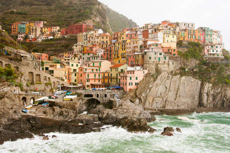 Manarola waterfront on a stormy day in the Cinque Terre, Italyの写真素材