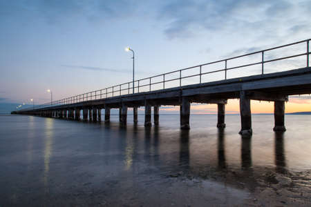 Rosebud pier just before sunrise in the Mornington Penisula, Victoria, Australiaの写真素材