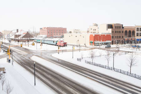 A snowstorm passes thru fargo, North dakota in winter.のeditorial素材