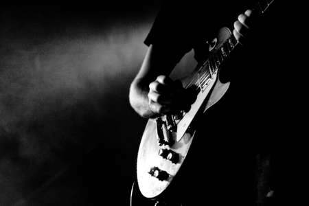 A guitarist plays his guitar in Melbourne, Australiaの写真素材