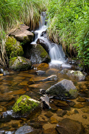 Boggy Creek stream flowing over rocks near Mt Buller, Victoria, Australiaの写真素材