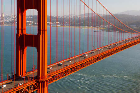 A view at midday thru the Golden Gate Bridge towards downtown San Francisco  IN California, USA 