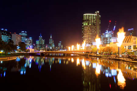 MELBOURNE, AUSTRALIA - JUNE 26 - Melbourne's famous skyline along Southbank with Crown Casino fire show on June 26th 2013.のeditorial素材