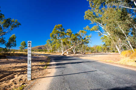 A period of drought has resulted in this dry river creek bed near Ormiston Gorge, Northern Territory, Australiaの写真素材