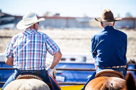 Wickenburg, USA - February 5, 2013: Riders compete in a team roping competition in Wickenburg, Arizona, USAのeditorial素材