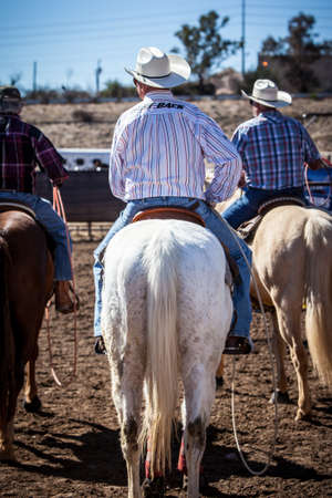 Wickenburg, USA - February 5, 2013: Riders compete in a team roping competition in Wickenburg, Arizona, USAのeditorial素材