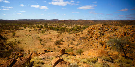A view towards the West Macdonnell Ranges from near the Old Telegraph Station in Alice Springs, Northern Territory, Australiaの写真素材