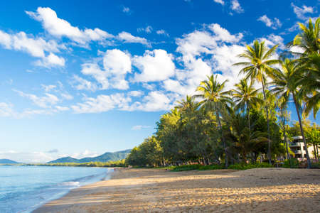 The famous idyllic beachfront of Palm Cove on a winter's day in Queensland, Australiaの写真素材