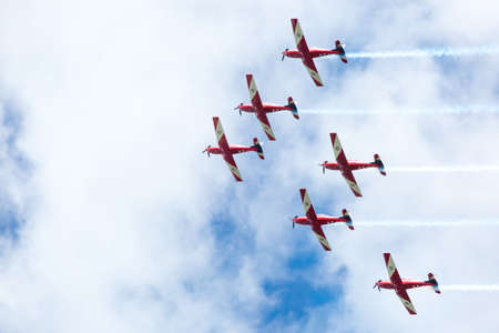 Melbourne, Australia - January 26 - The famous Red Arrows fly to celebrate Australia Day in Melbourne, Victoria, Australiaのeditorial素材