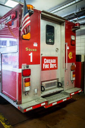 Chicago, USA - August 14, 2015: Chicago Metropolitan fire trucks sits inside a fire station in downtown Chicagoのeditorial素材