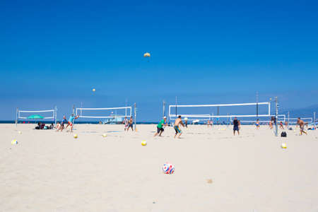 Los Angeles, USA - 9th August 2015: Volleyball courts on Santa Monica Beach on a warm sunny summer's dayのeditorial素材