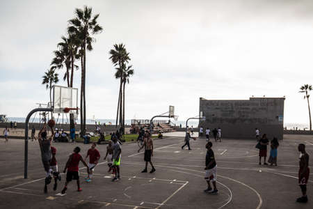 Los Angeles, USA - October 22: Public basketball games at Venice Beach Recreation Center in Los Angeles, California, USAのeditorial素材