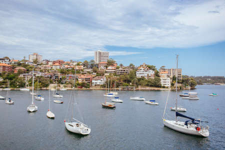 The view towards Sydney suburbs to the east and Curraghbeena Park from Cremorne Point on a clear spring dayの写真素材