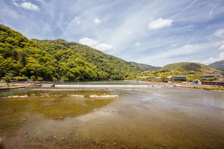 The view of the Katsura River from Togetsu Bridge in Arashiyama District in Kyoto, Japanの写真素材