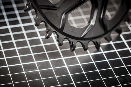 A bicycle front chainring ready to be installed onto a mountain bikeの写真素材