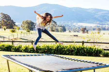 Kids on a Trampoline in Australiaの写真素材