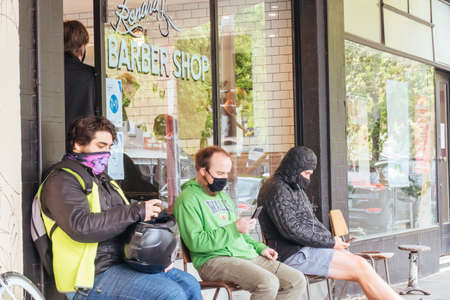 Busy Barber Shop in Melbourne During Coronavirus Pandemicのeditorial素材