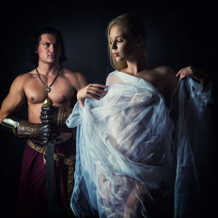 A man and a woman in a mystical romantic fantasy setting.の写真素材