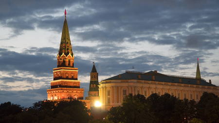 Tower of the Kremlin in Moscow at night. Against the background of moving cloudsの写真素材