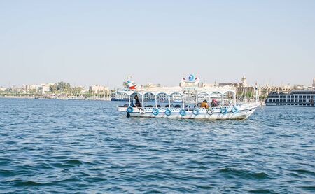 Luxor, Egypt - January 16, 2020 : Nile river near Luxor, Egypt. Motor boat on the Nile River in Egyptのeditorial素材
