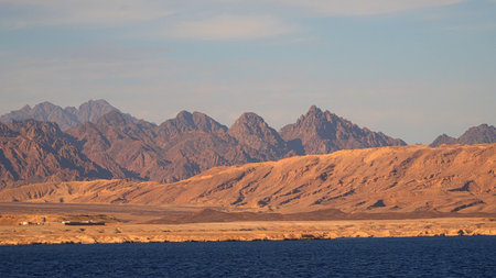 The coast of the Red Sea in the Sinai Peninsula. View from the sea. The Sinai Mountains are on the...