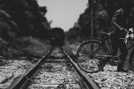Man crossing the line train moments before arriving train