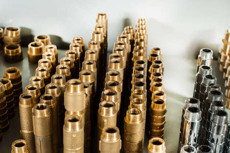 Plumbing equipment chrome and brass valves tees elbowsの写真素材