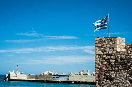 Greek flag on the top of fortifications. Greece, Creteのeditorial素材