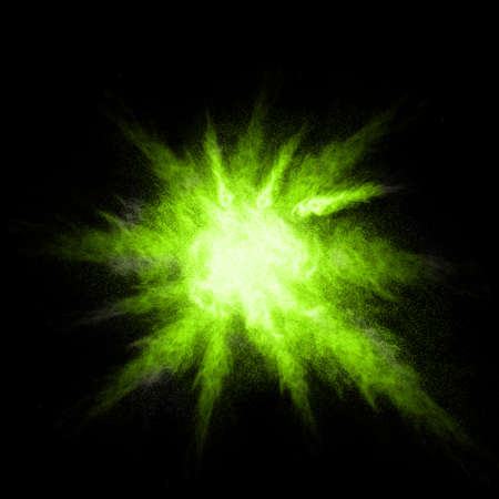 Stop motion of green dust explosion isolated on black backgroundの写真素材