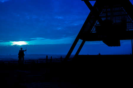 Lovers standing at the Prague Metronome, Czech Republicの写真素材