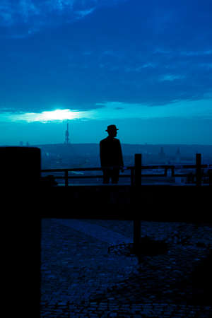 Man standing at the Prague Metronome, Czech Republicの写真素材