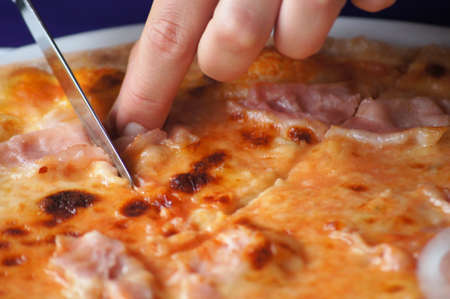 Appetizing pizza with ham and cheese/ detailの写真素材