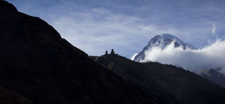 Kazbeg mountain with church, dramatic shot