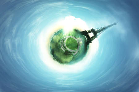 Eiffel Tower over Earth Globe with blue skyの写真素材