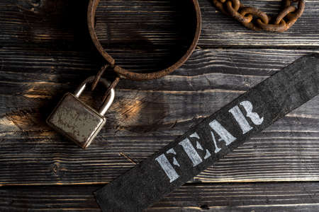 Collar of the fear. Fear clutches your neck.の写真素材