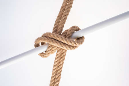 Double Clove Hitch Knot isolated on white background. Rope node.