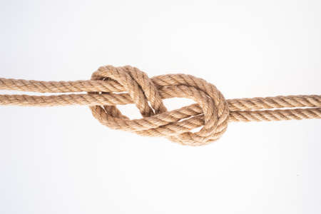 Double Figure Eight knot on white background. Rope nodeの写真素材