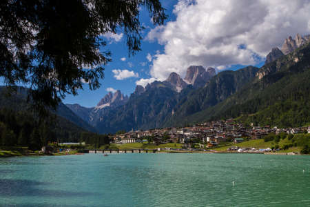 A view of the Lake of Auronzo's village between the Dolomiti's mountains, Italyの写真素材