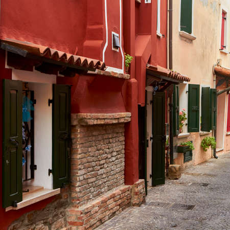 Among the colorful alleys of Caorle cityの写真素材