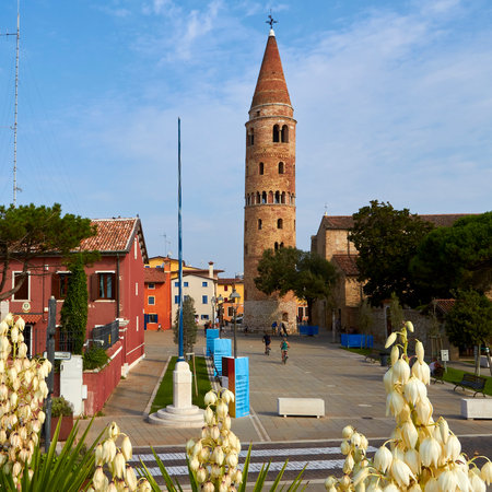 The bell tower of the Caorle's city in the province of Veniceの写真素材