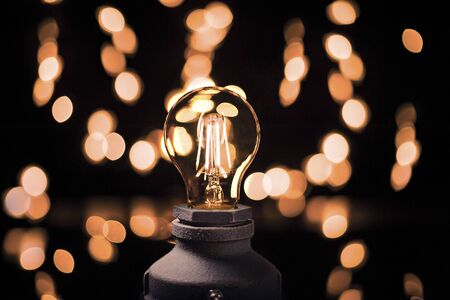 light bulb into lightの写真素材