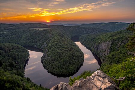 A beautiful sunset at Vyhlidka Maj (Viewpoint May). Meander of the river Vltava (Moldau) in Central Bohemia close to the Prague, Czech republicの写真素材
