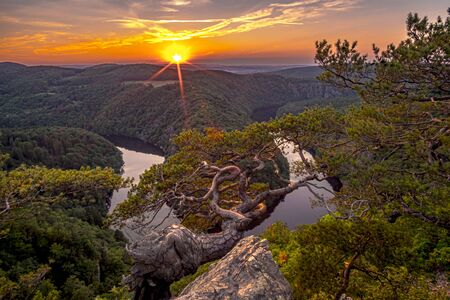 A beautiful sunset at Vyhlidka Maj (Viewpoint May). Meander of the river Vltava (Moldau) in Central Bohemia close to the Prague, Czech republicの写真素材