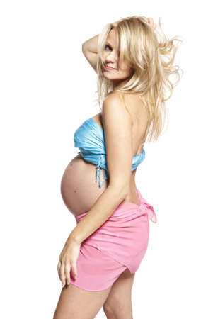 Portrait of a pregnant woman  Studio photo of pregnant woman isolated on white のeditorial素材