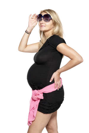 Portrait of a pregnant woman  Studio photo of pregnant woman isolated on white のeditorial素材