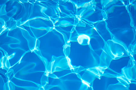 Shiny, clear, pure and transparent water in a swimming pool. Copy Space. Background.