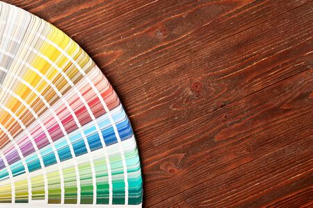 Color guide palette on wooden table with place for text.の写真素材